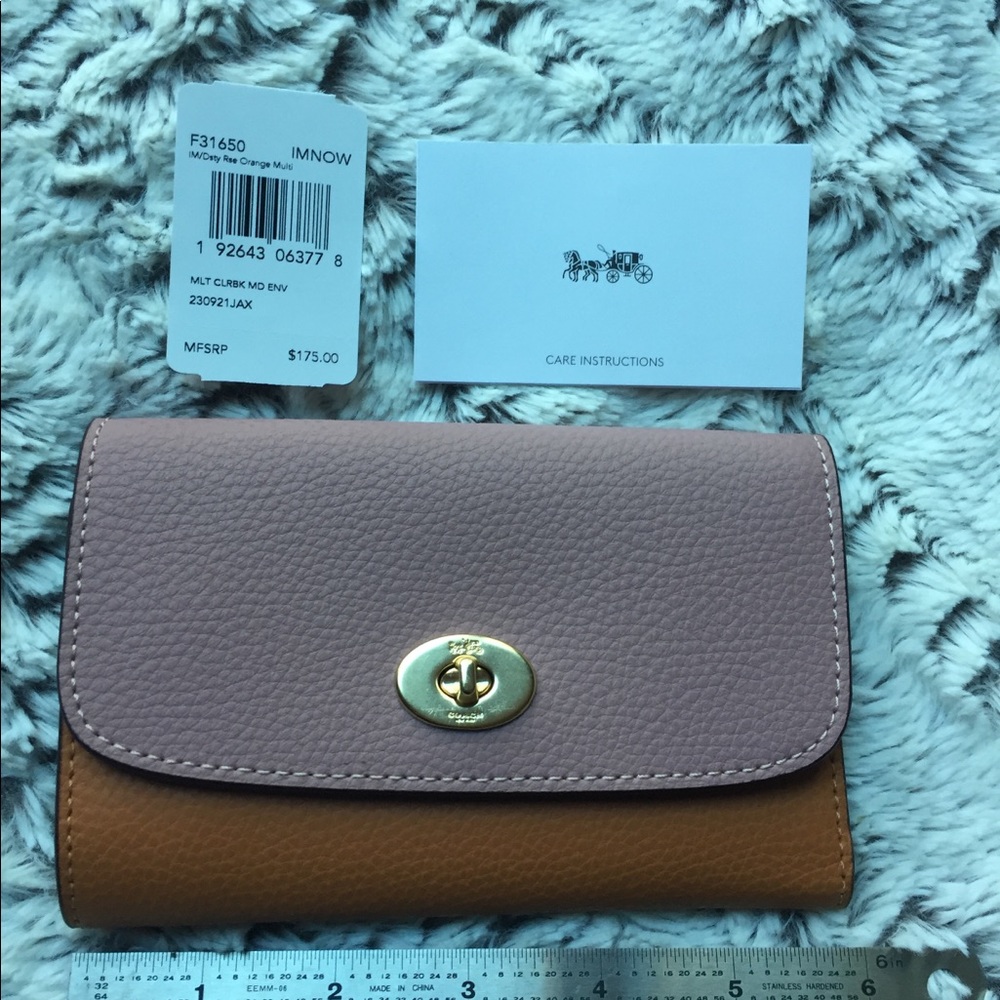 Brand NEW Coach color block wallet.